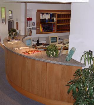 Granite reception lobby.  Curved work surface